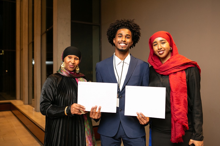 Hamza Saleh is flanked by his mom Zahra on the left and sister Fatima on the right