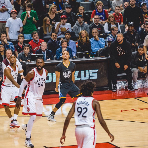 Drake sitting courtside as Goldenstate takes on Raptors